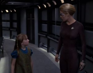 758px-Seven_interrogates_Naomi 758px-Seven_interrogates_Naomi